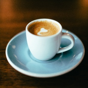 Cappuccino served in a blue cup