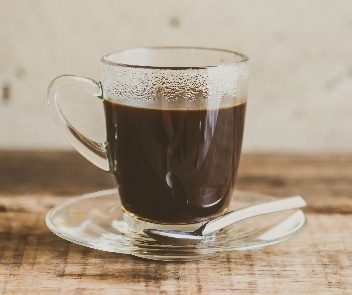 Freshly brewed coffee in a glass mug