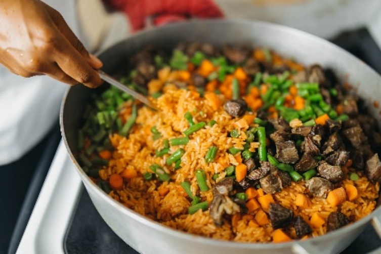 Jollof rice cooking in the pot