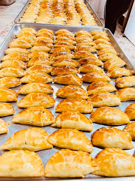 Catering tray of beef and fish patties